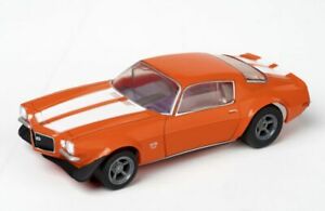 Orange Chevy Camaro SS396 slot car with white racing stripes, detailed interior and wheels.