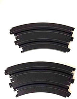 Two 9-inch 1/8 curve track pieces from the AFX 70603 slot car set.