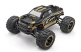 Blackzon Slyder MT 1/16 4WD Electric Monster Truck RTR in gold, with rugged off-road tires and bold black and gold design.