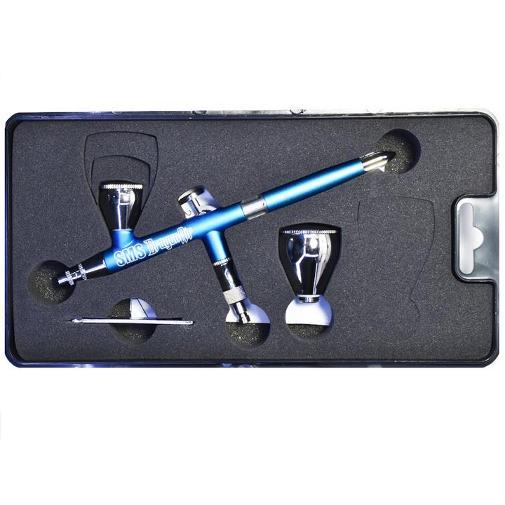 Compact blue airbrush set with dual action design and protective carrying case for professional-grade scale modeling applications.