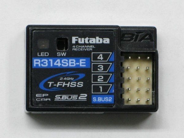Futaba R314SBE 2.4G radio receiver with 4-channel surface control, featuring LED indicators and connection ports.