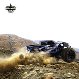 Blue off-road electric monster truck from Hobby Works racing across a rugged, rocky terrain