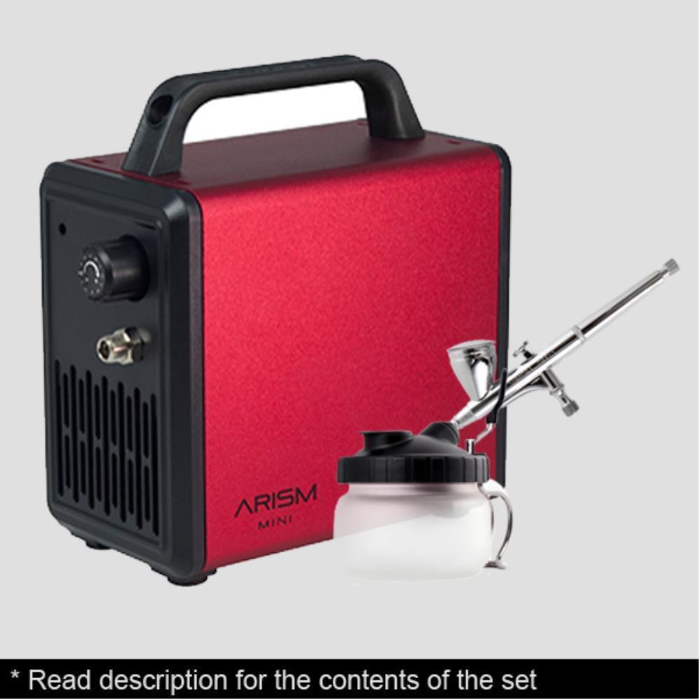 Sparmax Arism Mini Compressor with Max-3 Airbrush in burgundy red, a portable and versatile airbrush setup for precision painting tasks.