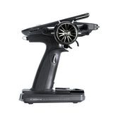 Sleek black wireless remote control with stylish dial and buttons for advanced RC operations.