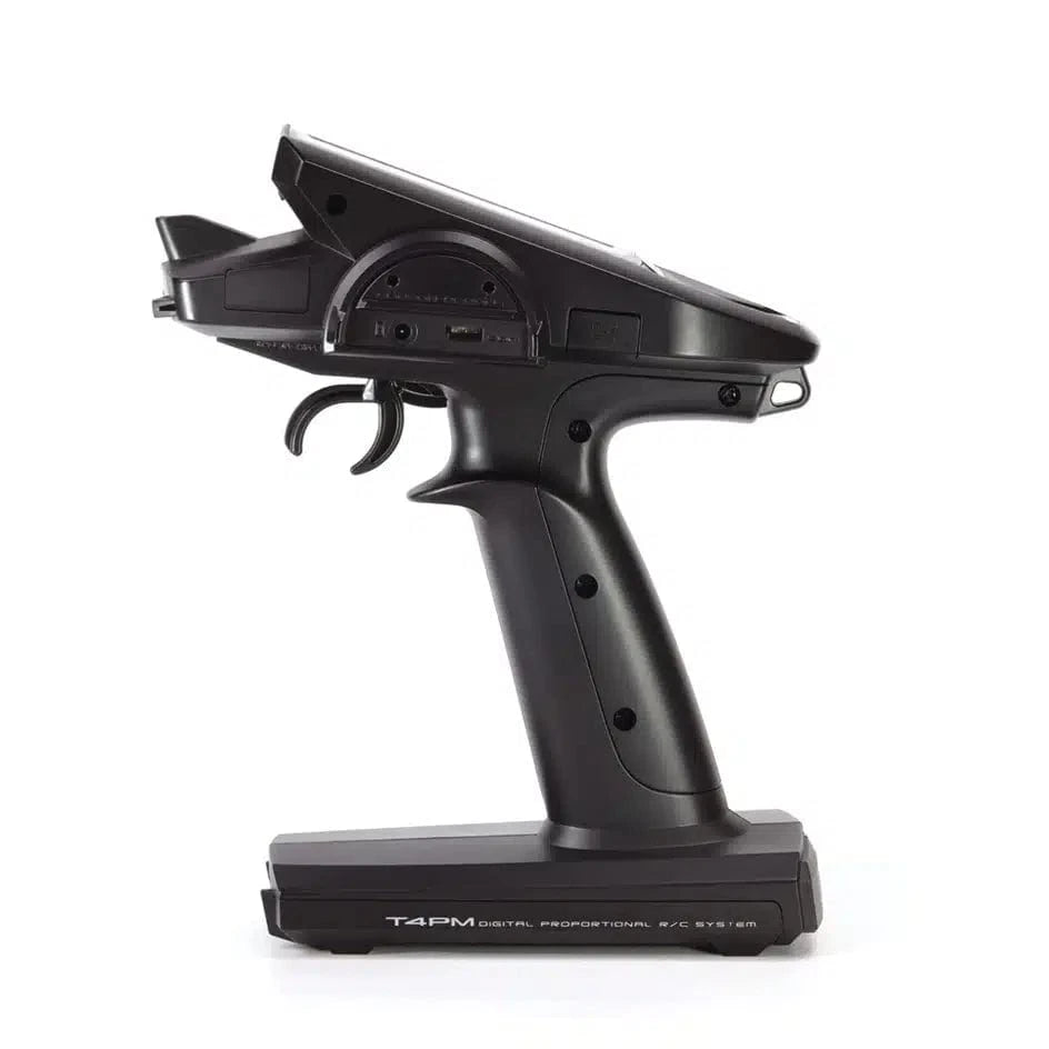 Futaba 4PM Plus 2.4ghz Transmitter with 2x R334SBS Receivers, a sleek and advanced radio gear for precise control.