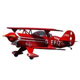 Detailed vintage-style red and white RC airplane with propeller engine and bold lettering "GEFIZ" on the fuselage, ready for flight.