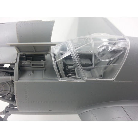 Detailed 1/32 scale plastic model kit of the Do335B-2 heavy fighter aircraft by Hong Kong Models. The image shows the detailed exterior components and transparent canopy of the model, highlighting its intricate design and engineering.