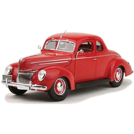 Detailed die-cast model of a 1939 Ford Deluxe Coupe in a vibrant red color, showcasing the classic American car's sleek, vintage design.