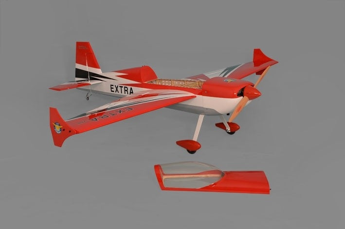 Vibrant red RC plane model with "EXTRA" branding, ready for advanced aerial maneuvers.