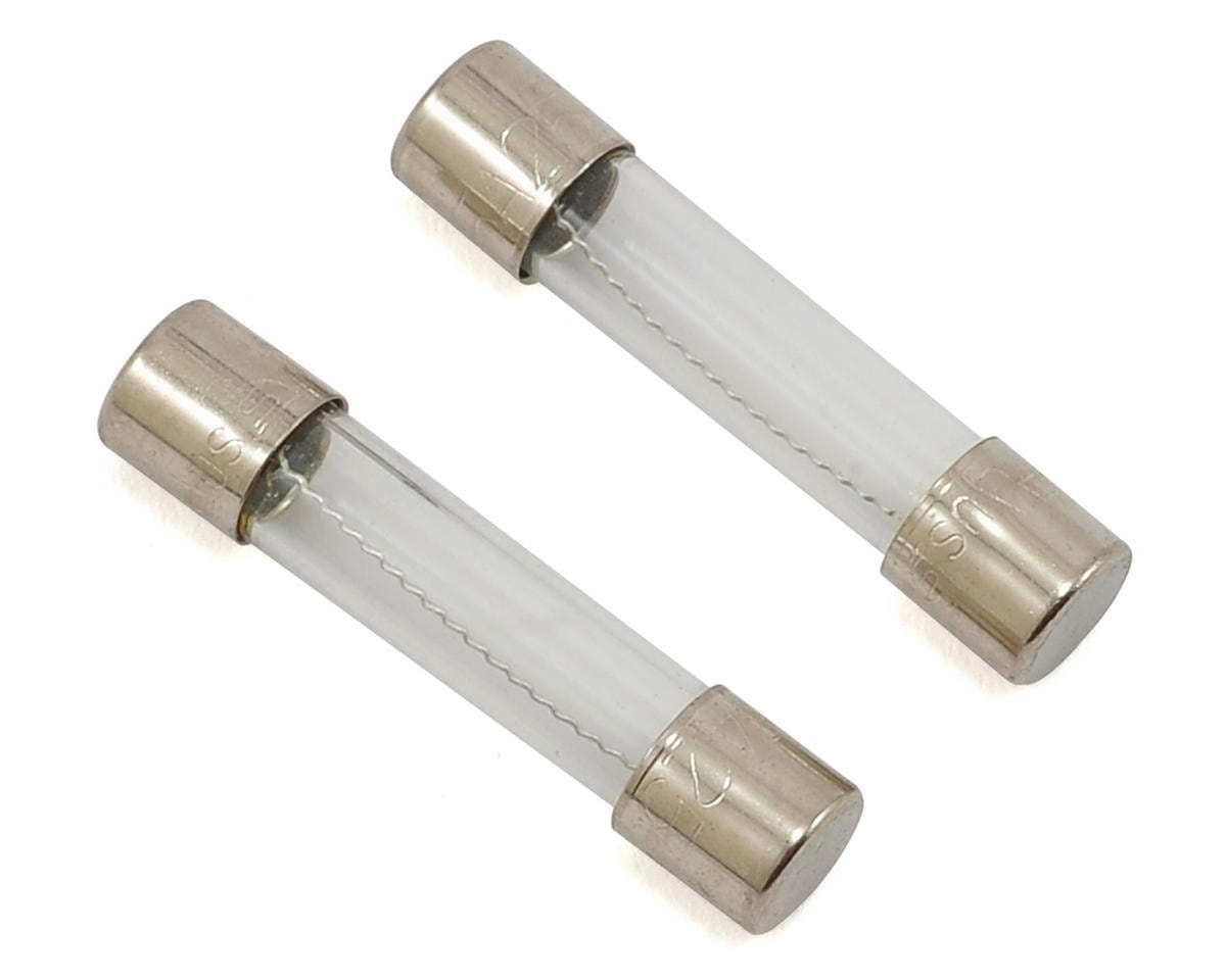 Two glass fuse components of Traxxas brand electric accessories, featuring a silver metallic body and transparent glass enclosure.